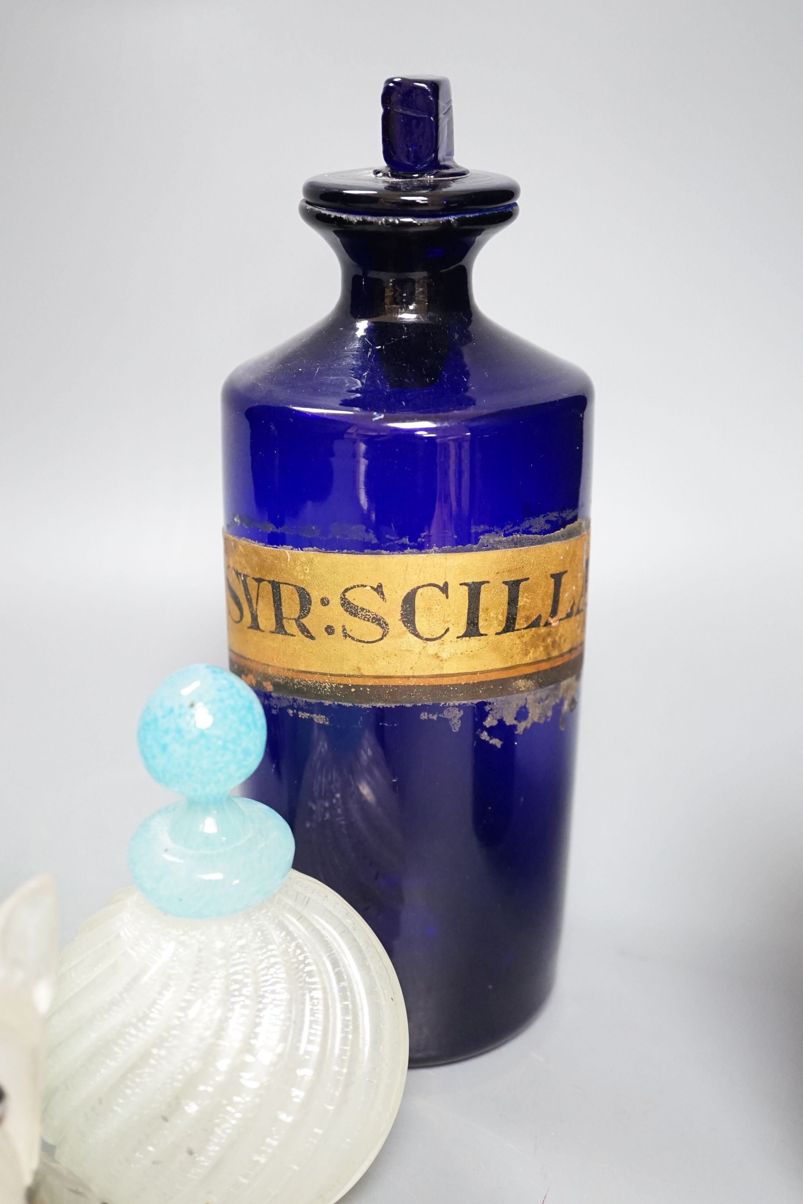 A pair of blue glass drug jars and a novelty glass dog inkwell etc, tallest 24 cms high